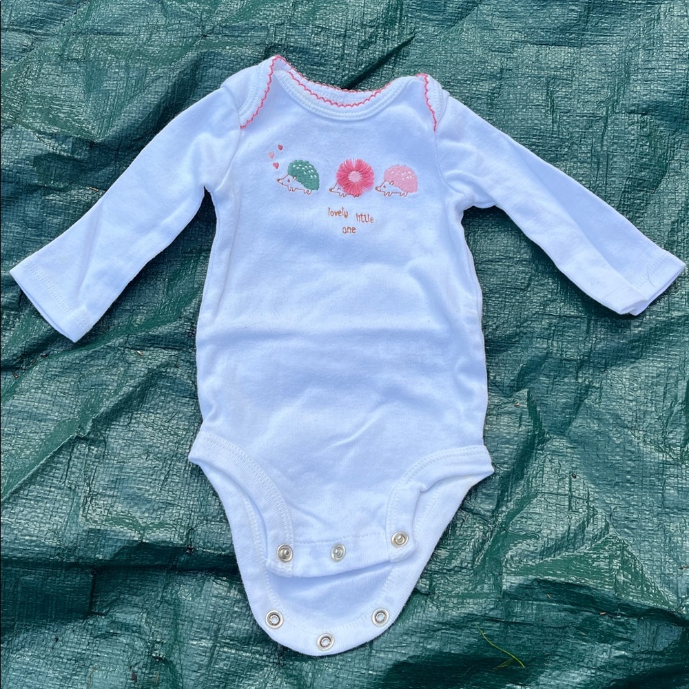 Adorable White Baby Onesie with Hedgehog Design